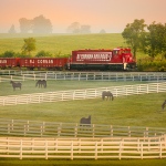 R. J. Corman locomotive pictured behind horse farm