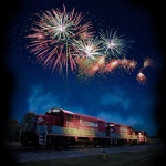 R. J. Corman Locomotive with fireworks display in the background
